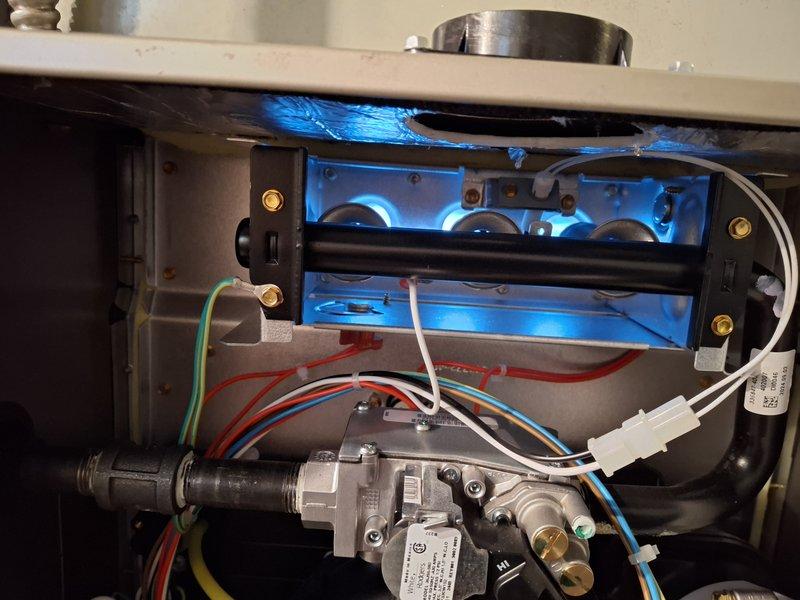 # HVAC Maintenance - Heating System Service Report

Performed comprehensive annual maintenance on a 2-year-old gas furnace system in accordance with manufacturer specifications and MVP service protocol. Conducted thorough inspection of all critical heating components including heat exchanger, burner assembly, gas valve, ignition system, and venting connections.

Inspected heat exchanger fins for cracks, corrosion, or deterioration; verified proper alignment and structural integrity of all fin assemblies. Examined burner assembly while unit was in operation; confirmed proper flame characteristics with consistent blue flame pattern across all burner ports, indicating optimal air-to-fuel ratio and complete combustion. Verified gas valve operation and inspected all electrical connections, including ground wire, control wiring, and safety circuit connections; all wire terminations were secure with appropriate connectors in place.

Tested ignition sequence and flame sensor response. Checked 