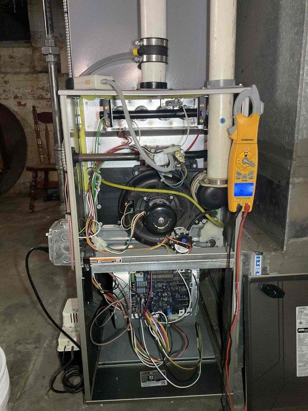 # HVAC Service Report

## Service Performed: Gas Furnace Maintenance

Completed scheduled maintenance on a 4-year-old residential gas furnace. Removed front access panel and performed comprehensive system inspection of all internal components including blower assembly, control board, ignition system, and electrical connections. Utilized digital diagnostic testing equipment to verify proper electrical readings and system performance parameters. Inspected PVC condensate drainage system and all venting connections for proper installation and function. Checked blower motor operation and verified all wire connections throughout the unit were secure and properly routed. Examined heat exchanger accessibility and overall cabinet condition. All components found operating within normal specifications with no immediate repairs required at this time.