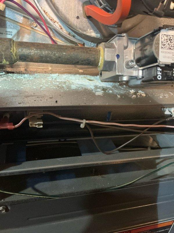 # No Heat Service Call - 15-Year-Old Furnace

Responded to a no heat call on a 15-year-old gas furnace. Upon inspection, found the unit's gas valve and associated piping showed significant corrosion and age-related deterioration. Verified ignition system was functioning properly with burners achieving proper flame characteristics. Assessed overall system condition, documented equipment wear, and confirmed unit was operational at time of service completion.