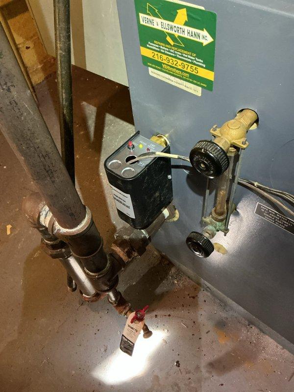 Performed comprehensive hot water boiler tune-up including replacement of low water cutoff (LWCO) and automatic feeder assembly. Installed new LWCO control device with brass valve connections and updated auto feeder system to ensure proper water level maintenance and safe boiler operation. All copper piping connections were secured and system was tested for proper functionality upon completion.