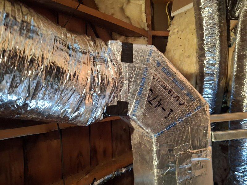 Responded to callback for detached ductwork in attic that had separated from air handler following previous repair visit. Upon arrival, found flexible duct connection had completely detached from air handler unit, which customer had temporarily secured with duct tape to restore heating to entire home. Properly reconnected flexible metallic ductwork to air handler using appropriate fasteners and mastic sealant, ensuring secure attachment and proper airflow distribution throughout the system. Verified all connections were sealed and tested system operation to confirm heating restored to all zones of residence.