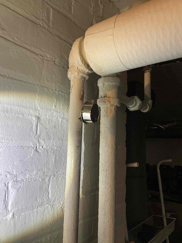 Performed estimate on steam boiler system with identified crack in heat exchanger. Documented existing boiler installation including piping configuration, insulation condition on steam lines, and overall system components for replacement assessment.