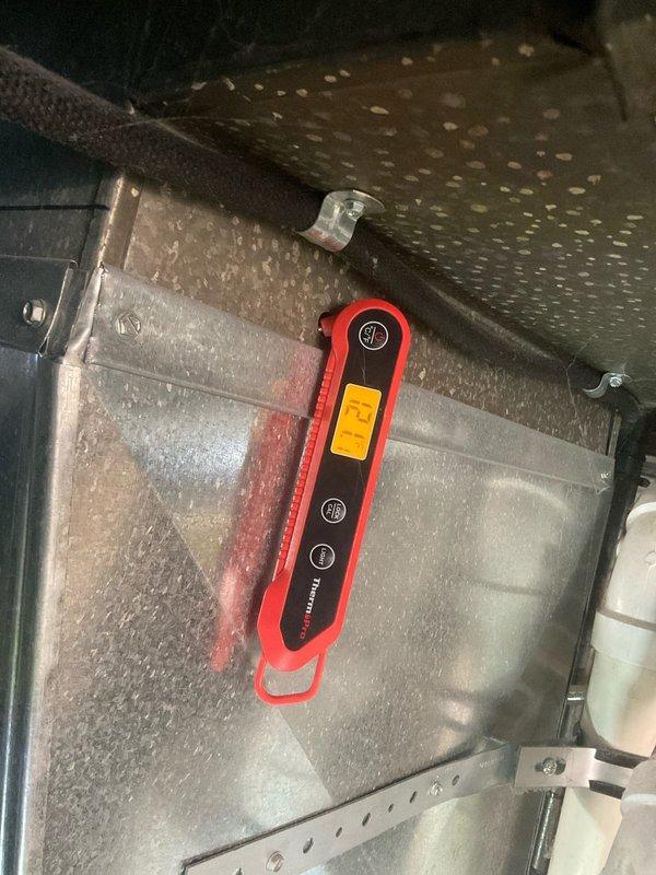 Completed comprehensive tune-up service on residential air conditioning and furnace system. Performed diagnostic testing using digital manometer to verify proper airflow and static pressure readings, measuring 75.4 inches water column within the air handler unit. Inspected internal components, electrical connections, and insulation integrity on both heating and cooling equipment to ensure optimal system performance and energy efficiency.