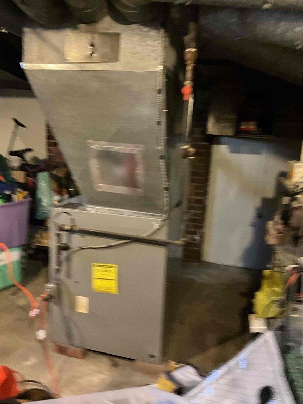Conducted furnace replacement estimate for residential heating system experiencing no heat condition. Documented existing HVAC equipment installation in basement, including furnace unit, air handler, ductwork, and associated piping systems. Customer notified that required replacement parts will arrive in several days, with installation scheduled to accommodate customer's overnight work schedule.