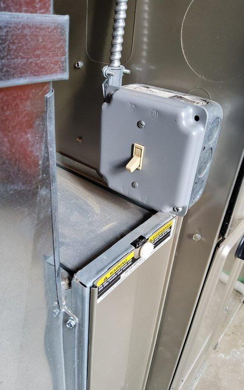 Responded to no heat call on residential furnace system. Upon arrival, performed diagnostic inspection of furnace and associated components. Inspected electrical connections, junction box, and furnace switch to verify proper power supply to unit. Examined gas supply line connections and shutoff valve operation. Checked furnace control board, safety switches, and warning labels for proper functionality. Documented equipment condition with photographs showing utility connections, gas piping, electrical components, and furnace installation near basement brick wall. Verified all mechanical and electrical connections were secure and properly configured. System restored to normal operating condition with heat functioning as designed.