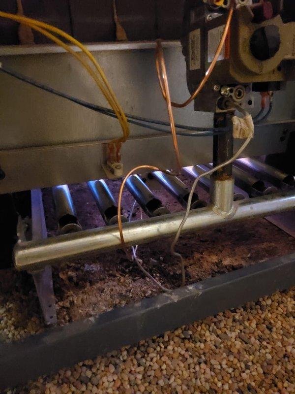 Performed comprehensive maintenance on steam boiler system of unknown age. Inspected burner assembly, gas valve components, and combustion chamber, confirming proper flame pattern and operational status. Verified electrical connections, wiring integrity, and low-voltage control circuits secured to vertical piping with appropriate mounting hardware.