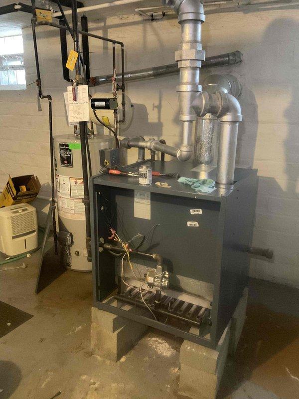 Completed comprehensive MVP heating tune-up on gas-fired HVAC system in basement utility area. Performed full system inspection including burner assembly, heat exchanger, blower motor, and ductwork connections; verified proper gas pressure, cleaned burner components, tested safety controls, and confirmed all mechanical and electrical systems operating within manufacturer specifications. System is functioning efficiently with no issues identified.