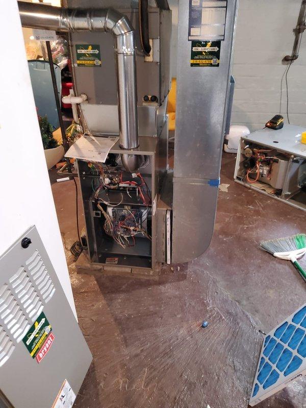 Completed furnace and thermostat replacement in basement mechanical room. Successfully removed existing furnace unit and installed new replacement furnace, reconnecting to existing ductwork and utilizing existing air handler, filter rack, and air conditioning system. Installed new thermostat, verified all electrical connections, tested system operation, and confirmed proper functionality of heating cycle.