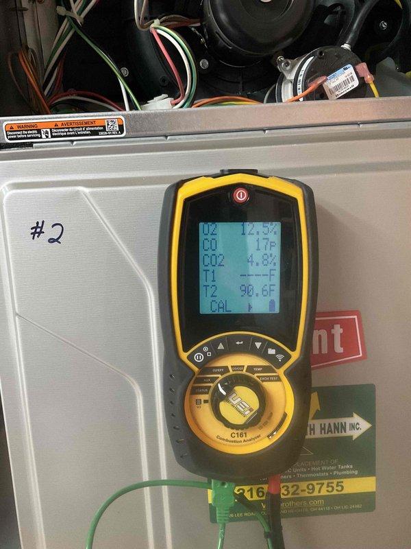 Completed scheduled Home Plan heating tune-up on system #2. Performed comprehensive combustion analysis showing oxygen levels at 12.4%, carbon monoxide at 1 ppm, carbon dioxide at 4.8%, and stack temperature at 90.6°F, all within acceptable operating parameters. System operating efficiently with no issues found.