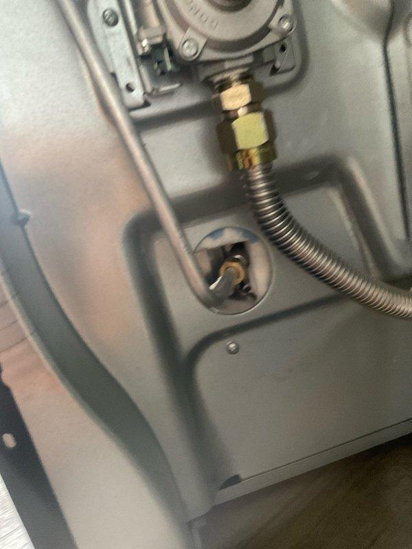 Performed gas leak and pressure test on residential gas line system in preparation for new stove installation. Upon arrival, confirmed gas service to home was shut off at meter. Conducted thorough visual inspection of existing gas piping, including flexible gas connector and brass fittings at furnace connection point. Tested all accessible gas line connections and joints for leaks using approved testing methods. Verified proper gas valve operation and assessed gas line routing for code compliance. Inspected flexible corrugated stainless steel gas line condition and connection integrity at HVAC equipment. All tested connections passed pressure test with no leaks detected. System confirmed ready for new appliance hookup and gas service restoration.