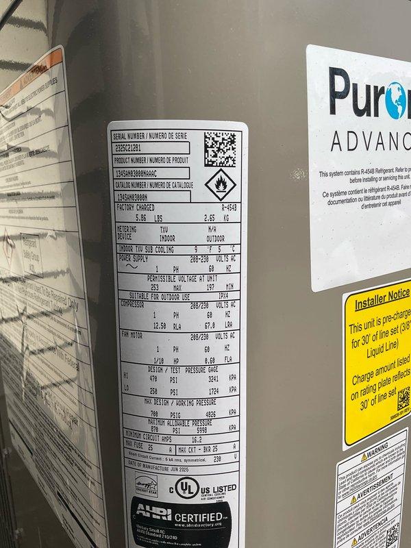 Performed seasonal A/C start-up and system inspection. Verified unit specifications, refrigerant charge levels, and proper labeling on outdoor condensing unit. Documented equipment nameplate data including serial number, model information, electrical specifications, and refrigerant type for service records. System operational and ready for cooling season.