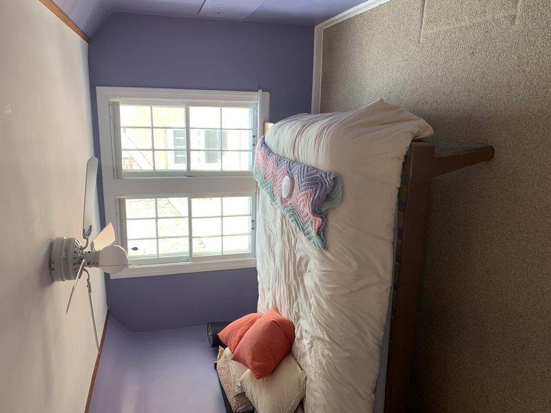 Conducted on-site assessment for multi-story residence currently equipped with boiler system and furnace/AC serving main floor only. Evaluated heating and cooling requirements for unserved second and third floor areas, inspecting existing mechanical infrastructure and available installation pathways. Documented current HVAC configuration including exposed ductwork and equipment locations in upper level spaces. Provided professional recommendations comparing heat pump system versus alternative HVAC solutions for upper floor climate control, discussing zoning options to integrate with existing first-floor equipment while maintaining independent temperature control for each level.