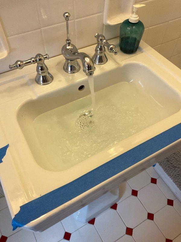 Responded to a clogged bathroom sink in a seventy-year-old home. Successfully cleared the drain obstruction, restoring proper water flow and drainage function. Tested the fixture to confirm the sink was draining properly with no backup or slow drainage issues.