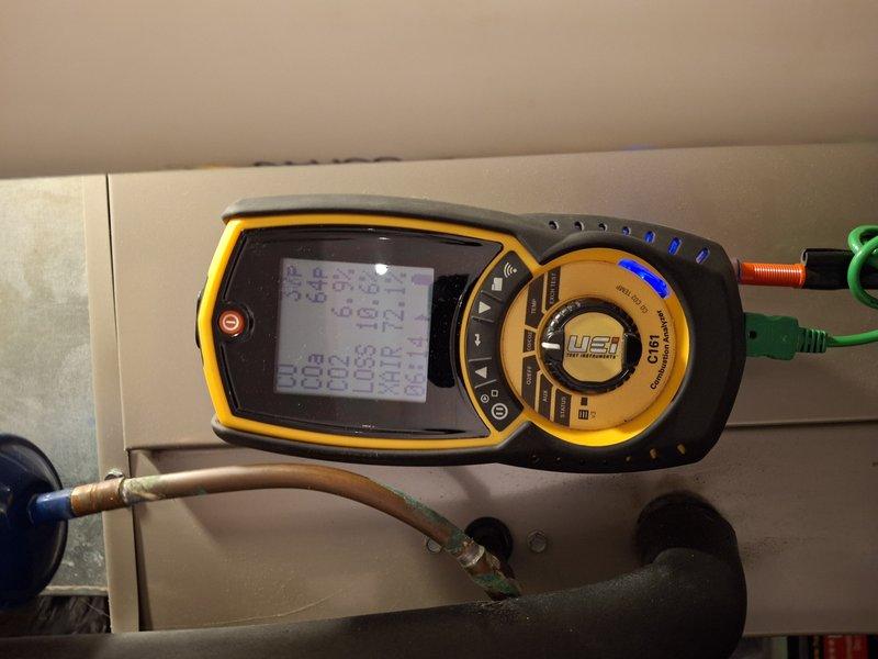 Completed scheduled heating maintenance on a 10-year-old furnace system. Performed comprehensive tune-up including inspection of heat exchanger, burner assembly, and system diagnostics using digital manifold gauge to verify proper refrigerant pressures and operating temperatures. All components found operating within normal parameters with frost pattern on evaporator coil indicating proper heat transfer during system operation.