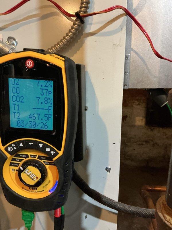 Completed annual maintenance on 8-year-old residential steam boiler system. Performed comprehensive combustion analysis using digital analyzer, recording flue gas temperature, CO2 levels, and system efficiency parameters. Inspected all safety controls, pressure gauge operation, shut-off valves, and piping connections. Verified proper water level, cleaned and tested low water cutoff, and examined all electrical connections and control board functionality. System operating within manufacturer specifications with no deficiencies noted.