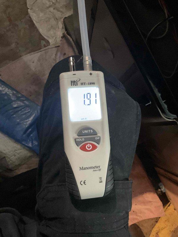 Completed furnace maintenance and addressed humidifier leak issue. Performed system diagnostics with manometer reading of 191, inspected internal components with access panel removed, and serviced unit to resolve excessive water leakage from humidifier system.