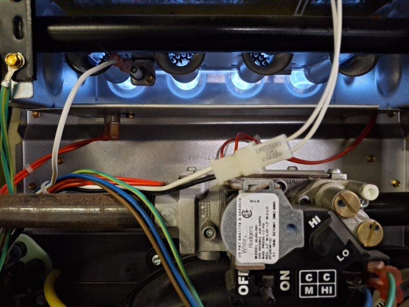 Completed comprehensive AC tune-up and preventive maintenance on 6-year-old cooling system. Inspected condenser coil fins for proper airflow, noting minor debris accumulation that was cleared during service. Verified furnace burner assembly operation with proper flame characteristics and inspected gas valve, ignition system, and all electrical connections for safe operation. Confirmed both heating and cooling systems are functioning within manufacturer specifications with no deficiencies noted at time of service.