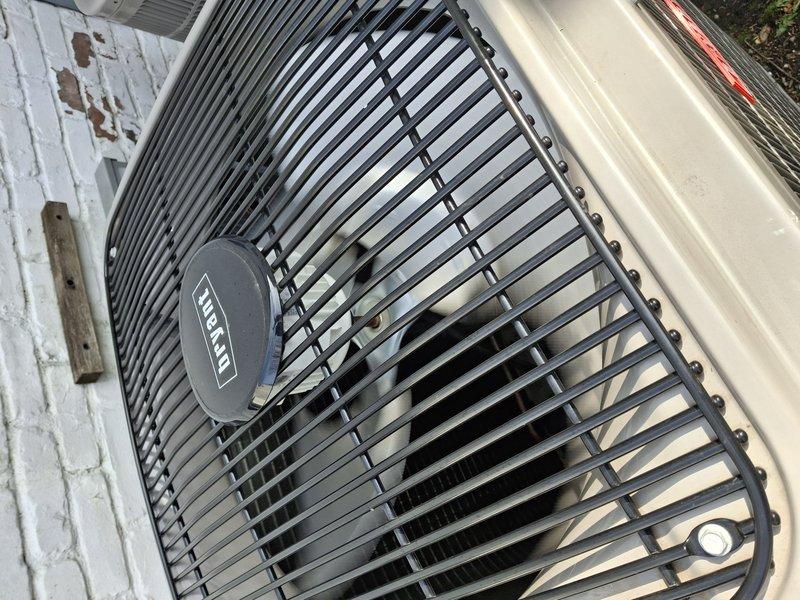 Performed comprehensive tune-up service on two Bryant AC units, each approximately two years old and in good working condition. Conducted full system diagnostics using manifold gauge set to verify refrigerant pressures and charge levels on R-22 system, inspected condenser coils and fan assemblies, and confirmed both outdoor units were operating within manufacturer specifications. All components tested satisfactorily with no repairs required, leaving both systems prepared for summer cooling season.