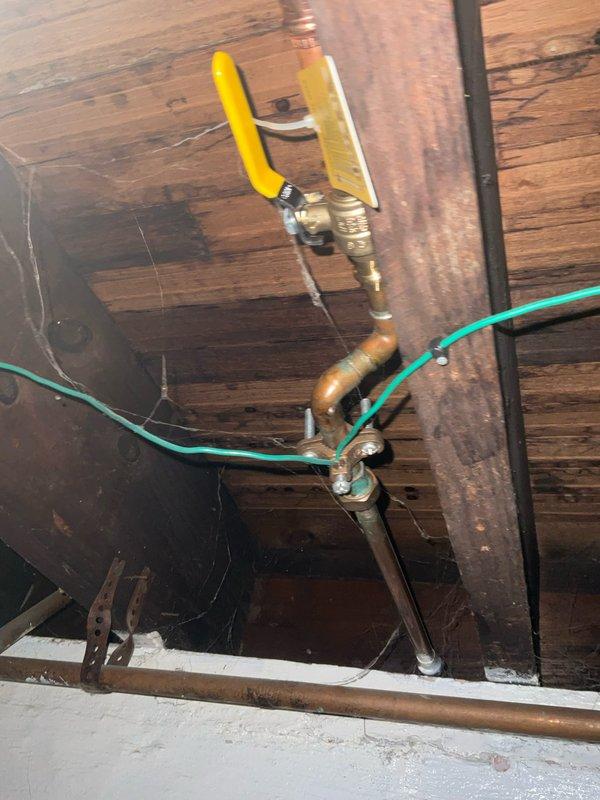 Responded to service call for broken outdoor water spigot at century-old residential property. Upon inspection, found failed exterior hose bib requiring replacement due to age-related deterioration and freeze damage typical of older plumbing systems. Removed defective spigot assembly and installed new brass ball valve with lever handle for improved shutoff control and durability. Connected valve to existing copper supply line using appropriate compression fittings and flexible connector to accommodate seasonal expansion and contraction. Tested system for proper operation and verified no leaks at connection points. Advised homeowner on seasonal winterization procedures to prevent future freeze damage to exterior plumbing fixtures.