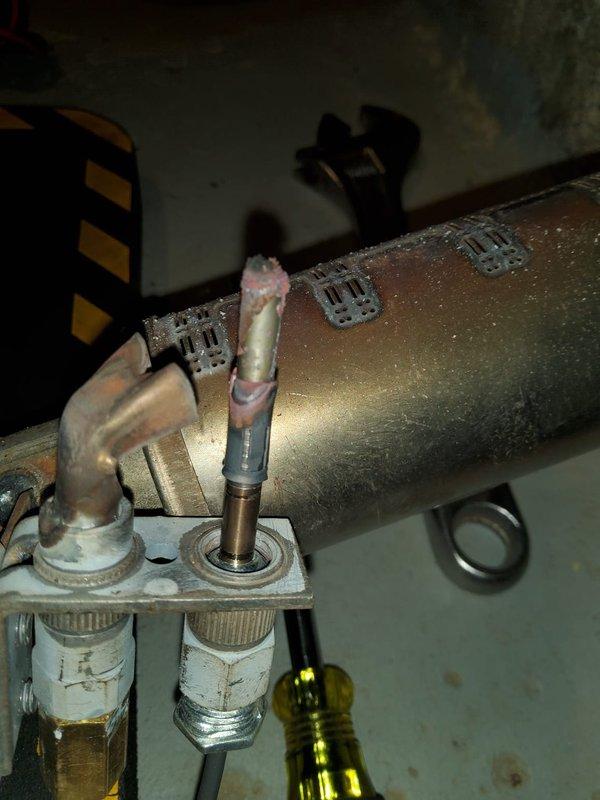Completed annual maintenance on residential boiler system. Performed comprehensive tune-up inspection including visual assessment of all accessible components, piping connections, and mounting hardware. Inspected copper supply lines, valve assemblies, and connection points for proper operation and signs of wear. Noted minor surface corrosion and mineral deposits on copper fittings consistent with system age. Verified proper pipe support and mounting bracket integrity throughout installation. Confirmed boiler operational status and system functionality. All maintenance procedures completed per manufacturer specifications and member plan requirements.