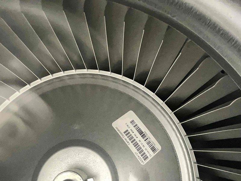 Responded to service call for thermostat error code on furnace installed last August. Performed comprehensive furnace tune-up including inspection of burner assembly, blower wheel, and all operational components. Verified proper combustion with blue flame pattern across burner assembly, inspected blower wheel for dust accumulation and wear, and checked all electrical connections and wiring harnesses. Completed humidifier tune-up as part of preventative maintenance service. Reset service reminder and documented system operation with photographic records showing burner operation and internal components functioning properly.