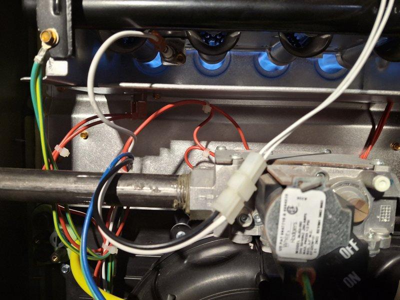 Completed annual furnace maintenance and cleaning on a four-year-old heating system. Performed comprehensive tune-up including inspection of gas valve assembly, electrical connections, and wiring harnesses. Verified all wire terminations were secure with proper color coding and connections intact. Inspected ventilation components including air intake grille and ductwork for proper airflow and structural integrity. Examined internal mechanical components, burner assembly, and heat exchanger. Cleaned unit as needed and confirmed all safety controls functioning correctly. System tested and operating within manufacturer specifications with no deficiencies noted. Unit left in proper working condition.