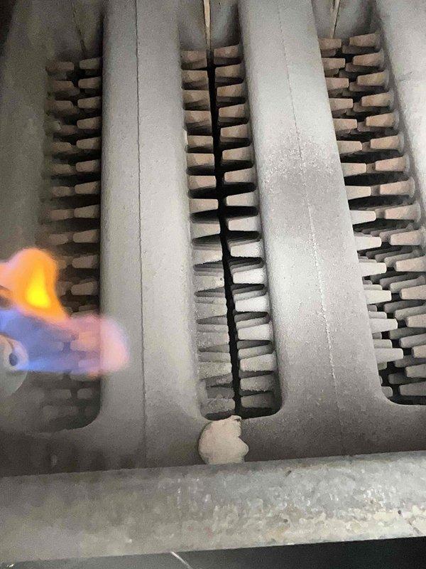 Performed comprehensive routine maintenance on residential gas furnace system. Inspected heat exchanger and burner assembly, confirmed proper ignition and flame characteristics with blue and orange flame pattern indicating efficient combustion. Verified all mechanical components operational, cleaned burner assembly, checked gas connections and exhaust venting for proper operation and safety compliance.