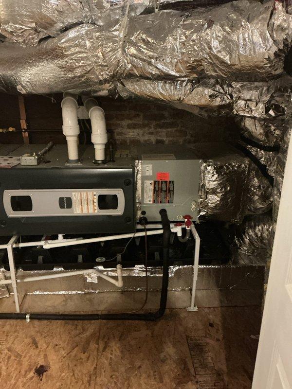 Completed estimate for replacement of ice-damaged air conditioning system in residential mechanical room. Evaluated existing HVAC air handler unit and associated ductwork, condensate drainage systems, and electrical connections to determine replacement requirements. Additionally assessed feasibility of relocating or replacing secondary unit, documenting current equipment configuration including gas piping, PVC drain lines, flex ductwork routing, and electrical panel connections for comprehensive replacement proposal.