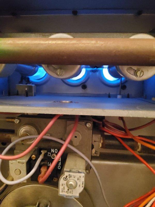 Completed comprehensive heating system tune-up and safety inspection on gas furnace. Performed combustion analysis using calibrated test equipment, confirming optimal burner operation with blue flame pattern and acceptable carbon monoxide levels at 30 ppm with 10.7% oxygen reading. Inspected all internal components including gas valve assembly, burner assembly, heat exchanger, electrical connections, and control systems to ensure safe and efficient operation for the heating season.