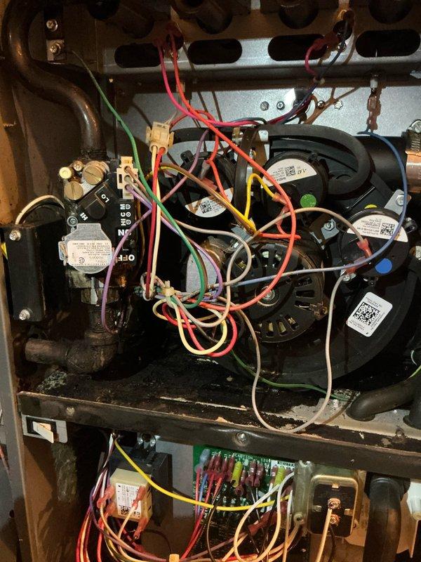 Completed comprehensive AC tune-up on cooling system, performing standard maintenance procedures including inspection of blower assembly, electrical connections, and internal components. Additionally inspected garage heater burners per customer request, as this was not completed during the initial tune-up visit.