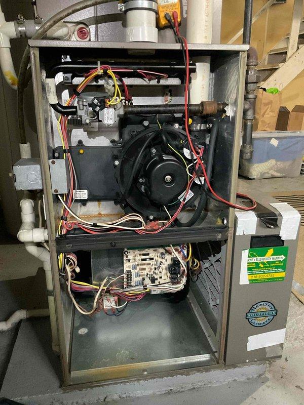 Completed comprehensive heating maintenance on residential furnace system. Performed thorough inspection of all internal components including blower motor assembly, inducer motor, control board, and electrical connections. Inspected and documented air filter condition, verified proper airflow, and checked all wiring connections throughout the unit. Examined PVC condensate drain lines and venting system for proper operation. All components found to be in operational condition with no immediate repairs required.