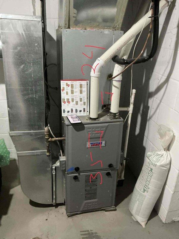 Conducted on-site evaluation of 12-year-old residential furnace system located in basement utility area to provide replacement estimate. Inspected existing gray metal furnace unit, associated PVC venting, condensate drainage system, and connected ductwork. Documented current system configuration including air handler, refrigerant lines, and plumbing connections. Captured photographic documentation of equipment condition and installation layout for estimate preparation. Provided replacement quote and scheduled follow-up appointment with customer requiring advance notification.