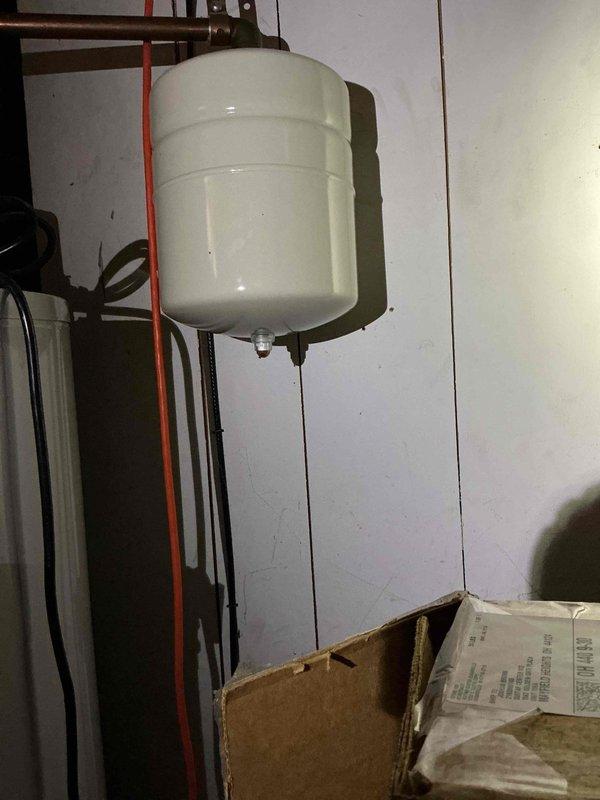 Responded to warranty call for newly installed furnace with no heat condition. Upon arrival, performed diagnostic inspection of heating system and associated components. Documented installation with photographs showing expansion tank, water heater, and mechanical room configuration. Verified system connections and operational status to determine cause of no-heat condition and restore heating function to residence.