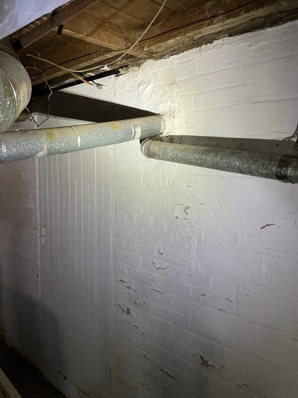 Conducted comprehensive on-site evaluation for complete furnace and air conditioning system replacement. Assessed existing HVAC equipment and infrastructure in basement mechanical area, documenting current installation conditions including ductwork, piping configurations, and structural considerations. Photographed equipment access points and exterior service areas to determine optimal replacement specifications and installation requirements. Provided detailed replacement estimate based on system capacity needs and existing infrastructure compatibility.