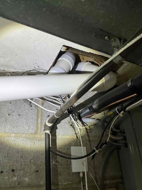 Conducted on-site evaluation for tankless water heater installation. Assessed existing plumbing infrastructure, electrical panel capacity, and utility space configuration to determine feasibility and requirements for system upgrade.