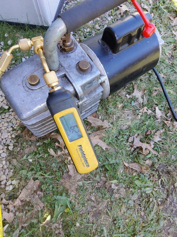 Completed full system replacement of air conditioning condenser unit and evaporator coil while reusing existing refrigerant line set. Verified electrical disconnect and circuit protection at 40-amp breaker, confirmed proper shutdown procedures prior to equipment removal. Performed vacuum pump evacuation of refrigerant lines to industry-standard specifications, monitoring system with digital micron gauge to ensure deep vacuum below acceptable moisture and contaminant levels. Installed new condenser and coil, made all necessary refrigerant connections, leak-tested system, and restored power for operational testing.