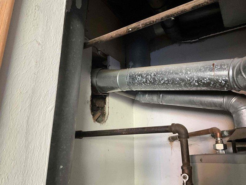 Responded to no heat call on 20+ year old furnace system. Diagnosed failed inducer motor requiring replacement. Due to unit age and parts availability issues, provided estimate for complete system replacement including new furnace and necessary ductwork connections.