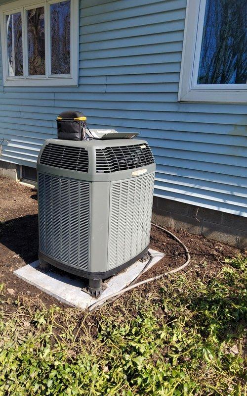 Performed comprehensive evaluation of 7-year-old heat pump system as requested second opinion. Upon inspection, identified significant electrical component deterioration including corroded contactor terminals and aged wiring connections showing oxidation and environmental damage. Documented unit condition with exterior and internal electrical compartment photography, revealing system installed on concrete pad with proper clearances but exhibiting wear consistent with age and exposure. Provided assessment findings and replacement recommendations to customer for consideration.