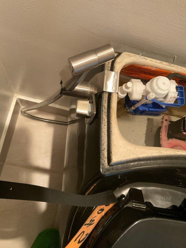 Responded to no-flush condition on Kohler toilet. Found toilet handle disconnected from flapper chain, preventing flush valve activation. Reconnected handle lift arm to flapper chain and adjusted chain length for proper slack and operation. Tested flush mechanism multiple times to verify full flapper lift and complete flush cycle. System restored to normal operation.