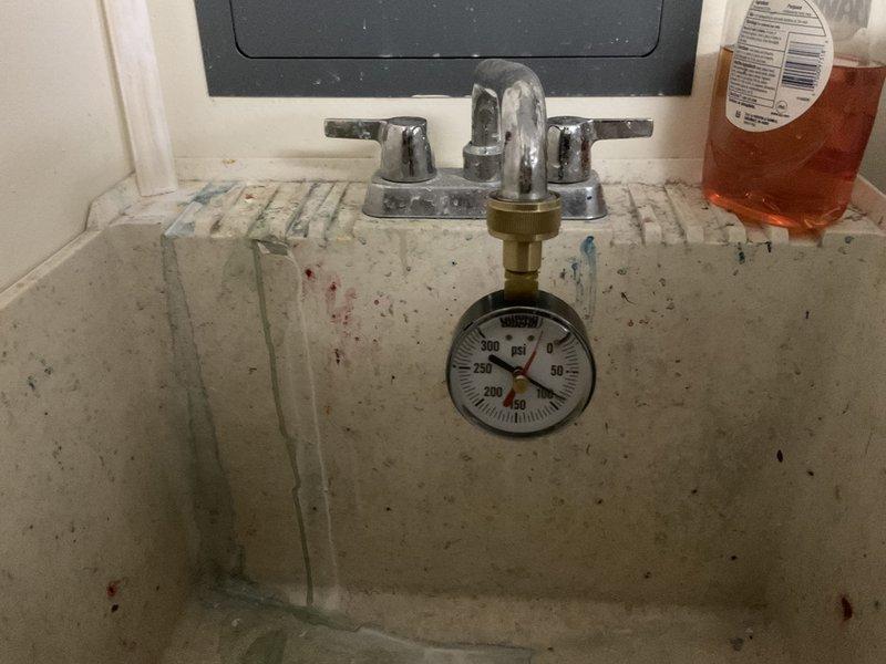 Responded to service call for leaking exterior hose bibb and squealing washing machine supply line. Upon arrival, performed system pressure test using calibrated gauge at laundry sink to verify operating pressure within acceptable range. Inspected exterior spigot and identified failed washer causing spray pattern during operation. Replaced defective components and tested for proper shut-off and flow. Addressed squealing noise at washing machine waterline connection, likely caused by restricted flow or valve issue. Verified all repairs, confirmed no leaks at connections, and ensured proper operation of both fixtures before completing service.
