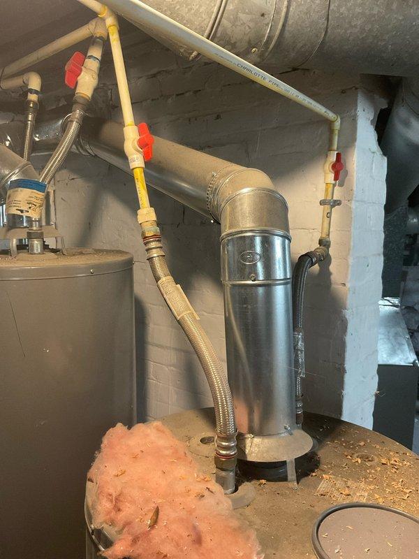 Responded to service call for tanked water heater with pilot light ignition failure. Upon inspection, diagnosed issue with gas control valve and pilot assembly preventing burner from lighting. Cleaned pilot orifice and thermocouple, tested gas flow to ensure proper pressure at burner assembly, and verified all safety controls were functioning correctly. Relit pilot light, confirmed main burner ignition sequence operated properly, and tested unit through complete heating cycle to verify restoration of hot water production.