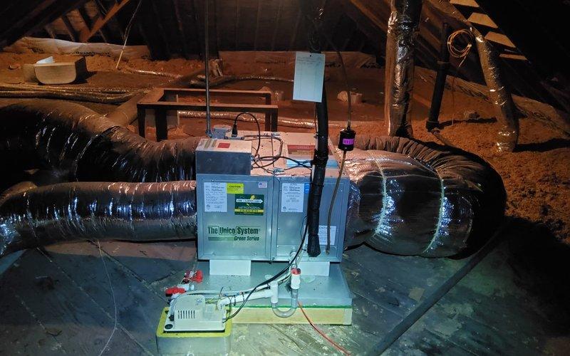 Responded to service call for attic-mounted Unico System air conditioning unit not cooling properly. Performed diagnostic inspection of both indoor air handler and outdoor condenser units. Completed necessary service procedures to restore proper system operation and verified adequate cooling performance upon completion.