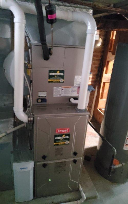 Responded to no cooling complaint on 1-year-old system with reports of loud noises from both air conditioning unit and furnace, along with air escaping sounds. Upon arrival, customer had already shut down equipment due to concerns. Performed diagnostic inspection of Bryant furnace and associated A/C system. Identified issues related to abnormal operational sounds requiring further investigation. System components including venting, ductwork, and cabinet panels were examined for potential air leaks or mechanical failures that could cause reported noise disturbances.