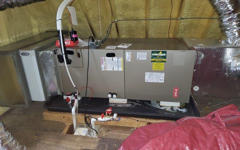 Responded to no cooling call on 4-year-old residential air conditioning system. Upon arrival, performed complete system diagnostic including visual inspection of indoor air handler unit located in attic space and outdoor condensing unit. Verified proper airflow through system, checked refrigerant pressures, and tested electrical components including contactors, capacitors, and safety switches. Inspected condensate drain line and float switch operation to ensure proper drainage and system protection. Examined outdoor condenser coil condition and noted surface discoloration and staining requiring attention. Cleaned condenser coils to remove accumulated debris and restore proper heat transfer efficiency. Verified system operation after service, confirmed adequate cooling performance, and ensured all safety devices functioning correctly. System restored to normal operation with proper temperature differential across evaporator coil. Documented equipment conditions with photographs for serv