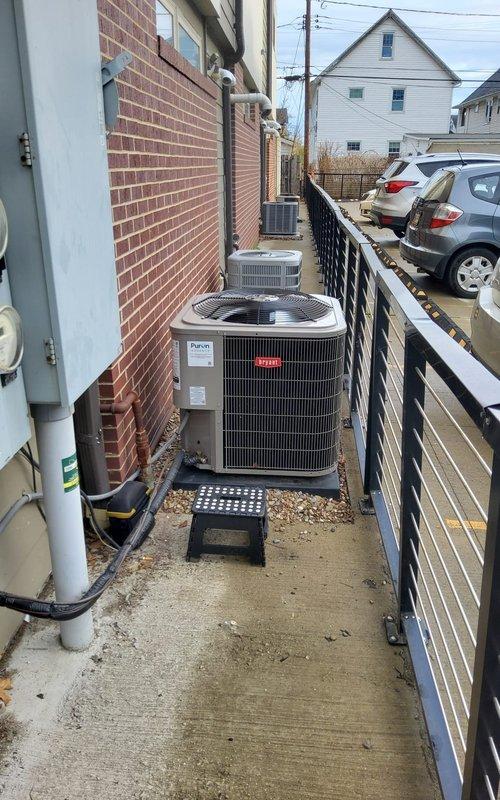 Completed cooling maintenance on Bryant HVAC system with multiple outdoor condenser units and indoor furnace. Performed comprehensive inspection of all cooling components, including condenser units mounted along exterior wall, indoor air handler, ductwork connections, and associated electrical and refrigerant lines. All equipment found to be operating within normal parameters and ready for cooling season.
