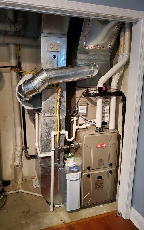 Completed cooling maintenance on Bryant HVAC system with multiple outdoor condenser units and indoor furnace. Performed comprehensive inspection of all cooling components, including condenser units mounted along exterior wall, indoor air handler, ductwork connections, and associated electrical and refrigerant lines. All equipment found to be operating within normal parameters and ready for cooling season.