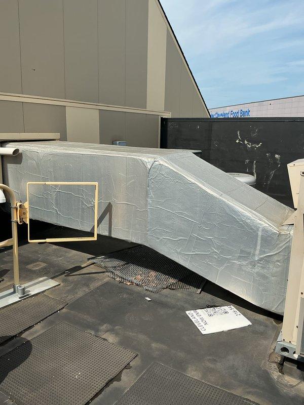 Conducted comprehensive site assessment of nine rooftop HVAC units for replacement estimate purposes. Documented existing packaged rooftop units, including equipment specifications, mounting configurations, refrigerant line routing, electrical disconnect locations, and roof conditions. Photographed all units, noting curb adapter dimensions, walkway pad locations, and accessibility requirements for future replacement planning.