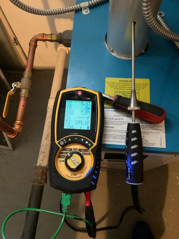 Completed preventive maintenance on two boiler systems including primary 8-12 boiler and secondary baby boiler unit. Performed comprehensive heating tune-up procedures on both systems, conducted combustion analysis testing with digital analyzer showing CO levels at 8.0%, CO2 at 7.8%, and flue temperature at 299.1°F. Inspected Weil-McLain EG series boiler components, verified proper operation of electronic controls, tested all safety switches and indicators, examined gas connections and copper piping, confirmed proper venting, and documented all system parameters within acceptable operating ranges.