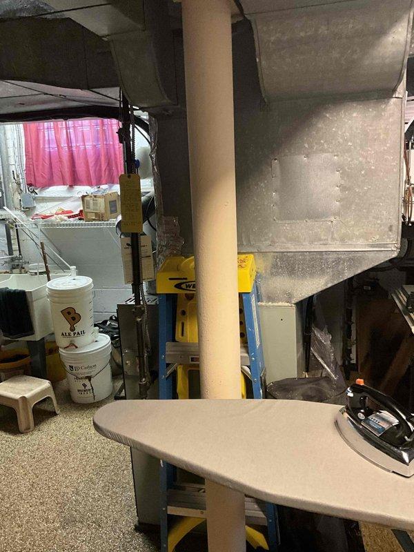 Completed HVAC estimate for replacement of outdoor air conditioning condenser unit due to chronic refrigerant leak requiring annual recharging. The existing 5-6 year old condenser unit exhibited signs of ongoing coolant loss, indicating system integrity compromise. Assessed equipment condition, documented existing installation on concrete pad against exterior wall with proper clearances, and evaluated indoor air handler components in basement. Provided comprehensive replacement estimate for new condensing unit with proper refrigerant specifications and warranty coverage.