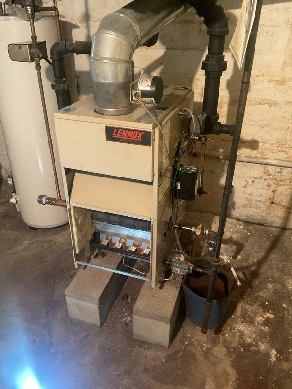 Completed comprehensive steam boiler tune-up and safety inspection on residential heating system. Performed combustion analysis using digital diagnostic meter, confirming proper oxygen levels at 21.0% and safe carbon monoxide readings. Verified system temperature readings, checked all safety controls, inspected venting and gas piping connections, and ensured unit was operating within manufacturer specifications for optimal efficiency and safe operation.